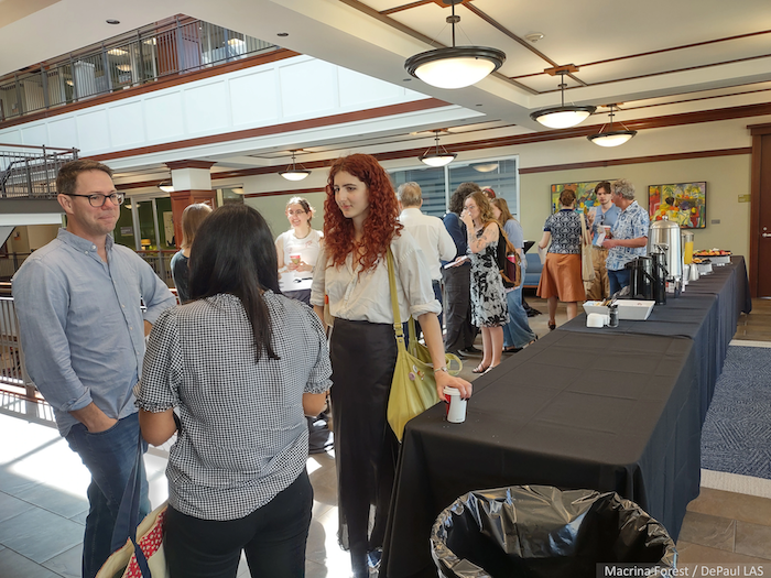 People chatting at a reception